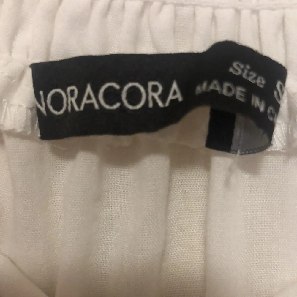 NORACORA white prarie like dress. Size Small. Ribbed at neck. - Picture 4 of 8